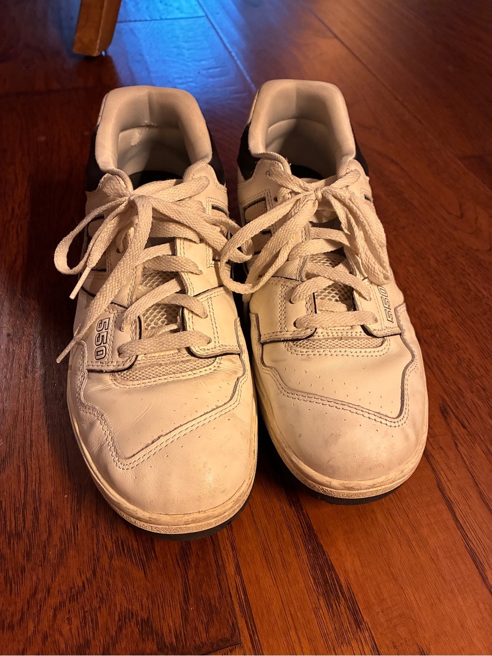 New Balance 550 White Sneakers with Black Heel Detail